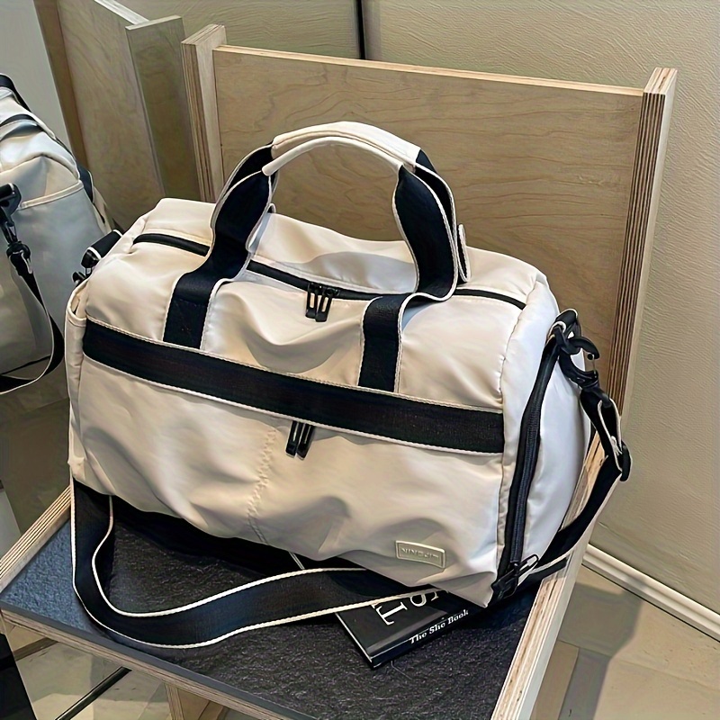 حقيبة سفر بعجلات كبيرة السعة م - مراجعة Weekender Bag Duffle وسعره