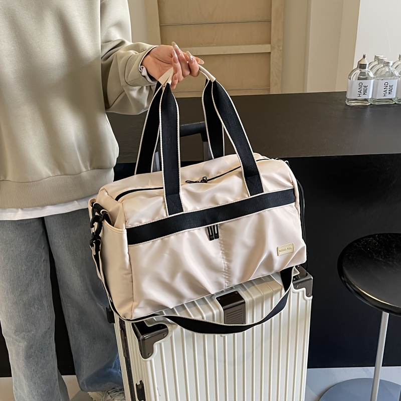 حقيبة سفر بعجلات كبيرة السعة م - مراجعة Weekender Bag Duffle وسعره